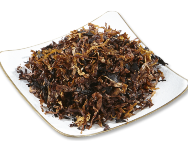 Small white plate holding Lane 1-Q Pipe Tobacco.